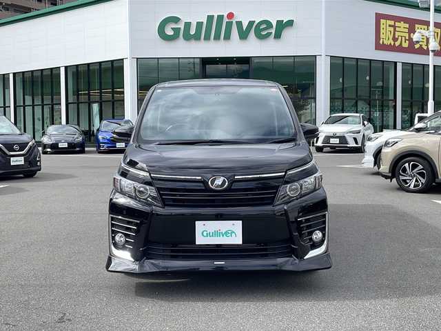 トヨタ ヴォクシー ZS 長野県 2014(平26)年 5万km ブラック TRDエアロ/純正9インチSDナビ（NSZT-Y64T）/FM・AM・DVD・CD・フルセグテレビ/Bluetooth Audio/ドライブレコーダー（YCD-18FHR）/両側パワースライドドア/レーダー探知機（YA-W17GA）/純正16インチアルミホイール/革巻きステアリング/アイドリングストップ/ステアリングスイッチ/LEDヘッドライト/オートライト/フォグランプ/純正フロアマット/ウィンカーミラー/ドアバイザー/プッシュスタート/スマートキー/ETC