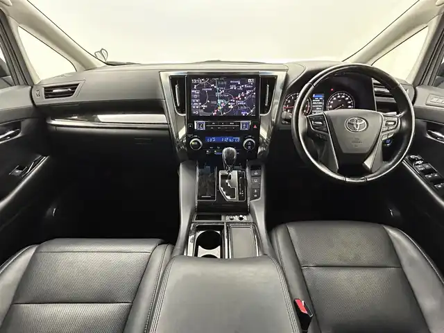 トヨタ アルファード S Cパッケージ 熊本県 2018(平30)年 6.7万km ホワイトパールクリスタルシャイン ワンオーナー/禁煙車/サンルーフ　/アルパインフリップダウンモニター　/アルパインナビ（ＣＤ・ＤＶＤ・フルセグ・ＢＴ・ＳＤ・USB）/バックカメラ　/社外前方ドライブレコーダー/ビルトインETC　/両側パワースライドドア　/パワーバックドア　/レーダークルーズコントロール/前席シートヒーター/前席エアーシート/前席・2列目パワーシート/ステアリングヒーター/助手席・2列目オットマン/衝突軽減ブレーキ/レーンキープアシスト/横滑り防止/前後クリアランスソナー/純正フロアマット/純正１８インチAW/オートライト/オートマチックハイビーム/三眼LEDヘッドライト/フォグランプ/スマートキー/プッシュスタート/スペアキー1本/取扱説明書