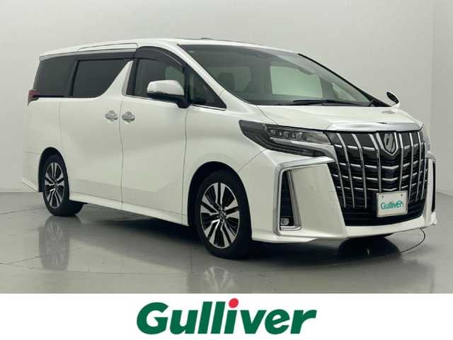 トヨタ アルファード S Cパッケージ 熊本県 2018(平30)年 6.7万km ホワイトパールクリスタルシャイン ワンオーナー/禁煙車/サンルーフ　/アルパインフリップダウンモニター　/アルパインナビ（ＣＤ・ＤＶＤ・フルセグ・ＢＴ・ＳＤ・USB）/バックカメラ　/社外前方ドライブレコーダー/ビルトインETC　/両側パワースライドドア　/パワーバックドア　/レーダークルーズコントロール/前席シートヒーター/前席エアーシート/前席・2列目パワーシート/ステアリングヒーター/助手席・2列目オットマン/衝突軽減ブレーキ/レーンキープアシスト/横滑り防止/前後クリアランスソナー/純正フロアマット/純正１８インチAW/オートライト/オートマチックハイビーム/三眼LEDヘッドライト/フォグランプ/スマートキー/プッシュスタート/スペアキー1本/取扱説明書