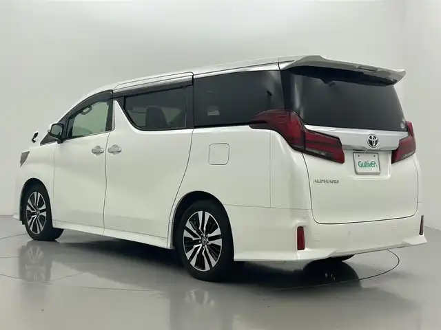 トヨタ アルファード S Cパッケージ 熊本県 2018(平30)年 6.7万km ホワイトパールクリスタルシャイン ワンオーナー/禁煙車/サンルーフ　/アルパインフリップダウンモニター　/アルパインナビ（ＣＤ・ＤＶＤ・フルセグ・ＢＴ・ＳＤ・USB）/バックカメラ　/社外前方ドライブレコーダー/ビルトインETC　/両側パワースライドドア　/パワーバックドア　/レーダークルーズコントロール/前席シートヒーター/前席エアーシート/前席・2列目パワーシート/ステアリングヒーター/助手席・2列目オットマン/衝突軽減ブレーキ/レーンキープアシスト/横滑り防止/前後クリアランスソナー/純正フロアマット/純正１８インチAW/オートライト/オートマチックハイビーム/三眼LEDヘッドライト/フォグランプ/スマートキー/プッシュスタート/スペアキー1本/取扱説明書