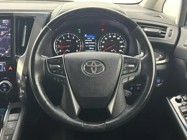 トヨタ アルファード S Cパッケージ 熊本県 2018(平30)年 6.7万km ホワイトパールクリスタルシャイン ワンオーナー/禁煙車/サンルーフ　/アルパインフリップダウンモニター　/アルパインナビ（ＣＤ・ＤＶＤ・フルセグ・ＢＴ・ＳＤ・USB）/バックカメラ　/社外前方ドライブレコーダー/ビルトインETC　/両側パワースライドドア　/パワーバックドア　/レーダークルーズコントロール/前席シートヒーター/前席エアーシート/前席・2列目パワーシート/ステアリングヒーター/助手席・2列目オットマン/衝突軽減ブレーキ/レーンキープアシスト/横滑り防止/前後クリアランスソナー/純正フロアマット/純正１８インチAW/オートライト/オートマチックハイビーム/三眼LEDヘッドライト/フォグランプ/スマートキー/プッシュスタート/スペアキー1本/取扱説明書