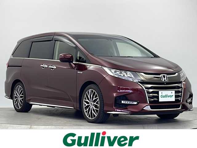 ホンダ オデッセイ ハイブリッド アブソルート・EXホンダセンジング 大阪府 2018(平30)年 5.1万km プレミアムディープロッソパール 純正ホンダインターナビ/・フルセグTV/・Bluetooth/・CD/DVD/・HDMI/純正後席モニター/リアエンターテイメントシステム/ホンダセンシング/ブラインドスポットモニター/全方位カメラ/レーダークルーズコントロール/衝突軽減システム/車線逸脱防止機能/ブレーキホールド/両側パワースライドドア/ハーフレザーシート/前席シートヒーター/後席オットマン/社外18インチアルミホイール