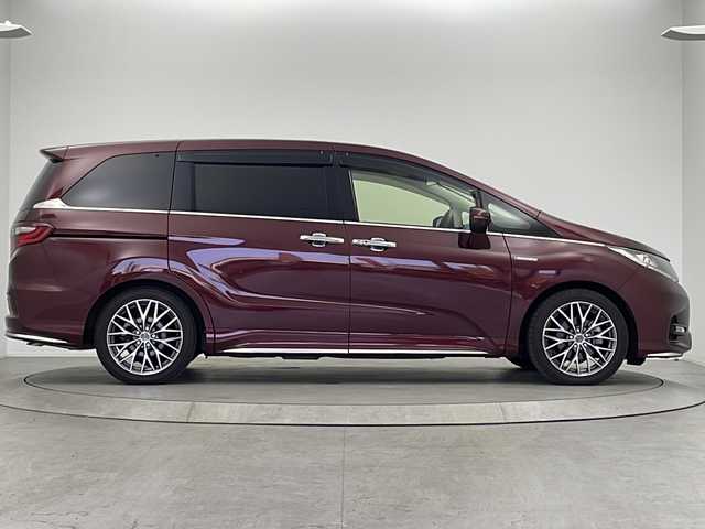 ホンダ オデッセイ ハイブリッド アブソルート・EXホンダセンジング 大阪府 2018(平30)年 5.1万km プレミアムディープロッソパール 純正ホンダインターナビ/・フルセグTV/・Bluetooth/・CD/DVD/・HDMI/純正後席モニター/リアエンターテイメントシステム/ホンダセンシング/ブラインドスポットモニター/全方位カメラ/レーダークルーズコントロール/衝突軽減システム/車線逸脱防止機能/ブレーキホールド/両側パワースライドドア/ハーフレザーシート/前席シートヒーター/後席オットマン/社外18インチアルミホイール