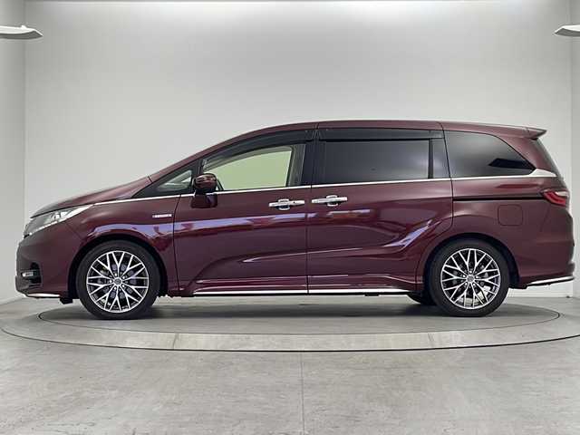 ホンダ オデッセイ ハイブリッド アブソルート・EXホンダセンジング 大阪府 2018(平30)年 5.1万km プレミアムディープロッソパール 純正ホンダインターナビ/・フルセグTV/・Bluetooth/・CD/DVD/・HDMI/純正後席モニター/リアエンターテイメントシステム/ホンダセンシング/ブラインドスポットモニター/全方位カメラ/レーダークルーズコントロール/衝突軽減システム/車線逸脱防止機能/ブレーキホールド/両側パワースライドドア/ハーフレザーシート/前席シートヒーター/後席オットマン/社外18インチアルミホイール