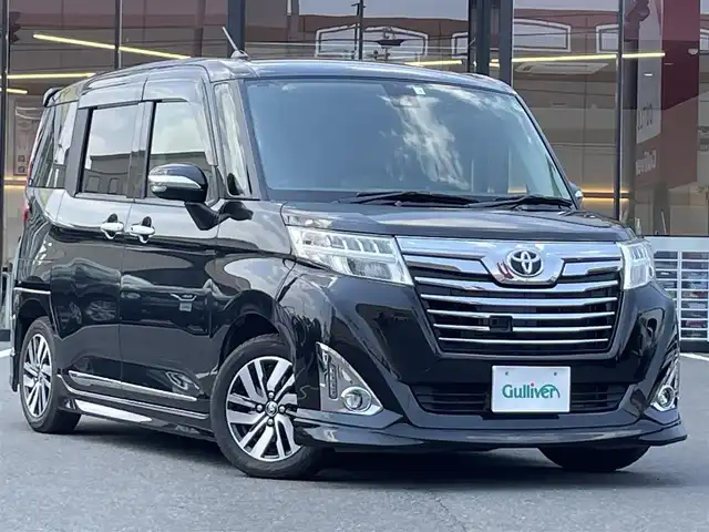 トヨタ ルーミー カスタムG S 宮城県 2018(平30)年 9.6万km ブラックマイカメタリック 登録時走行距離９５３２５ｋｍ/純正SDナビ/両側パワースライドドア/クルーズコントロール/フルエアロ/アイドリングストップ/衝突被害軽減システム/Bluetooth/フルセグ/AM/FM/ウインカーミラー