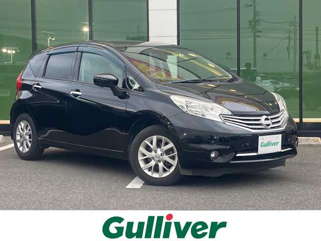 日産 ノート メダリスト X 福岡県 2016(平28)年 7.6万km スーパーブラック 純正SDナビ(MC315D-W)/FM/AM/CD/DVD/SD/BT/フルセグTV/アラウンドビューモニター/衝突被害軽減ブレーキ/車線逸脱警報/横滑り防止装置/アイドリングストップ/プッシュスタート/ETC/ステアリングスイッチ/オートライト/純正フロアマット/規格外15インチアルミホイール