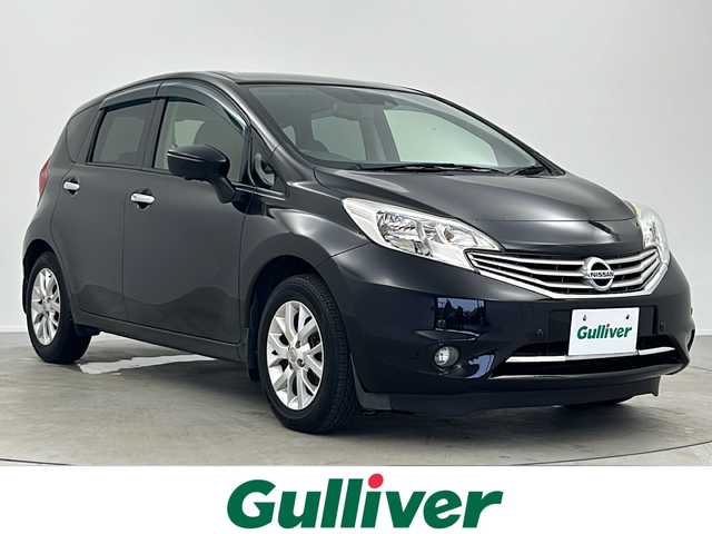 日産 ノート メダリスト X 大阪府 2016(平28)年 7.6万km スーパーブラック 純正SDナビ(MC315D-W)/FM/AM/CD/DVD/SD/BT/フルセグTV/アラウンドビューモニター/衝突被害軽減ブレーキ/車線逸脱警報/横滑り防止装置/アイドリングストップ/プッシュスタート/ETC/ステアリングスイッチ/オートライト/純正フロアマット/規格外15インチアルミホイール