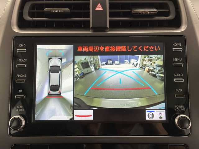 トヨタ プリウス A ツーリングセレ ブラックED 長野県 2022(令4)年 5万km ブラッキッシュアゲハガラスフレーク ４WD/パーキングアシスト/パノラミックビューモニター/ヘッドアップディスプレイ/トヨタセーフティセンス/プリクラッシュセーフティ/レーダークルーズコントロール/レーントレーシングアシスト/ロードサインアシスト/オートマチックハイビーム/AC100V1500Wアクセサリーコンセント/運転席パワーシート/前席シートヒーター/純正ナビ/（フルセグ/USB/Bluetooth/AppleCarPlay/AndroidAuto/ミラキャスト）/ドライブレコーダー/ETC2.0/LEDヘッドライト/２色切り替え式LEDフォグランプ/純正アルミホイール