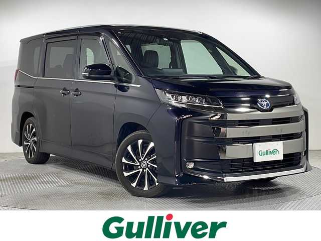 トヨタ ノア ハイブリッド S－Z 広島県 2023(令5)年 3.3万km スパークリングブラックパールクリスタルシャイン 禁煙車/純正１０．５型ナビ　/両側パワースライドドア　/後席モニター　/シートヒーター　/デジタルルームミラー　/バックカメラ　/レーダークルーズコントロール　/ステアリングヒーター　/フルセグ　/アダブティブLEDヘッドライト　/ETC/電動リアゲート/ユニバーサルステップ/ヘッドアップディスプレイ/純正17インチアルミホイール(205/55/R17)/エアバック（運転席/助手席/サイド/カーテン）