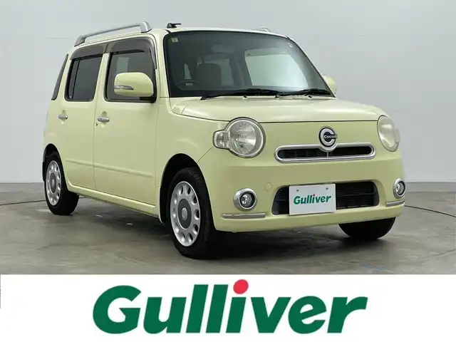 ダイハツ ミラ ココア プラスG 岡山県 2013(平25)年 3.7万km コットンアイボリー 純正メモリーナビ　/バックカメラ　/アイドリングストップ　/ミュージックサーバー　/ミュージックプレイヤー　/純正フロアマット　/フォグライト　/ルーフレール　/横滑り防止装置　/ハロゲンヘッドライト　/ＣＤ再生　/禁煙車