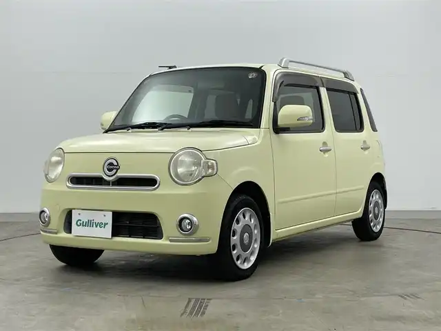 ダイハツ ミラ ココア プラスG 岡山県 2013(平25)年 3.7万km コットンアイボリー 純正メモリーナビ　/バックカメラ　/アイドリングストップ　/ミュージックサーバー　/ミュージックプレイヤー　/純正フロアマット　/フォグライト　/ルーフレール　/横滑り防止装置　/ハロゲンヘッドライト　/ＣＤ再生　/禁煙車