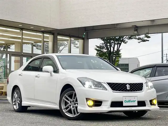 トヨタ クラウン アスリート i－Four 宮城県 2010(平22)年 14.6万km ホワイトパールクリスタルシャイン 純正ナビ/フルセグＴＶ/TRD　sportivoエアロ/ＡＭ／ＦＭ／ＣＤ／ＤＶＤ／ＵＳＢ　/クルーズコントロール/横滑り防止装置/アイドリングストップ/前席シートヒーター/前席パワーシート/オートライト（ＬＥＤ）　/スペアキー×１/スマートキー/社外フロアマット
