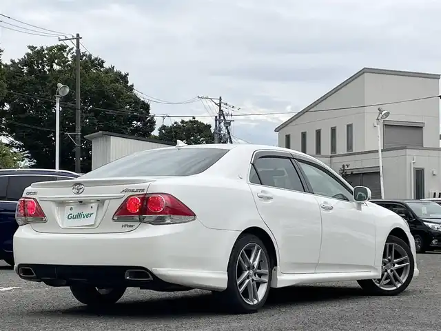 トヨタ クラウン アスリート i－Four 宮城県 2010(平22)年 14.6万km ホワイトパールクリスタルシャイン 純正ナビ/フルセグＴＶ/TRD　sportivoエアロ/ＡＭ／ＦＭ／ＣＤ／ＤＶＤ／ＵＳＢ　/クルーズコントロール/横滑り防止装置/アイドリングストップ/前席シートヒーター/前席パワーシート/オートライト（ＬＥＤ）　/スペアキー×１/スマートキー/社外フロアマット
