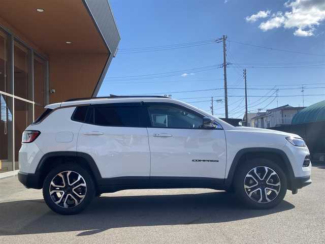 クライスラー・ジープ ジープ コンパス リミテッド 岐阜県 2021(令3)年 1.2万km パール オーディオナビゲーションシステム/　フルセグTV Bluetooth USB/　AppleCarPlay　Android Auto/アダプティブ クルーズ コントロール STOP GO機能付/LaneSense 車線逸脱警報プラス/前面衝突警報 クラッシュミティゲーション付/ブラインドスポットモニター リアクロスパスディテクション/ParkSenseフロント リアパークアシスト/ParkSense縦列 並列パークアシスト/Parkview リアバックアップカメラ/サラウンドビューカメラ/パワーバックドア/ブラックルーフレール