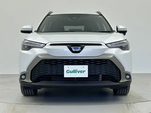 トヨタ カローラ クロス ハイブリッド Z 奈良県 2025(令7)年 1万km プラチナホワイトパールマイカ ・トヨタセーフティセンス/・プリクラッシュセーフティー/・レーンディーパーチャーアラート/・レーダークルーズコントロール/・レーンキープアシスト/・オートマチックハイビーム/・ロードサインアシスト/・先行車発進告知機能/寒冷地仕様/純正ディスプレイオーディオ１０．５インチ/・フルセグTV/Bluetooth/applecarplay//androidauto/miracast/HDMI /バックカメラ　/パワーシート/・ハーフレザーシート/・シートヒーター/ステアリングヒーター/電動リアゲート/SOSコール/純正フロアマット/LEDヘッドライト/・レベライザー有