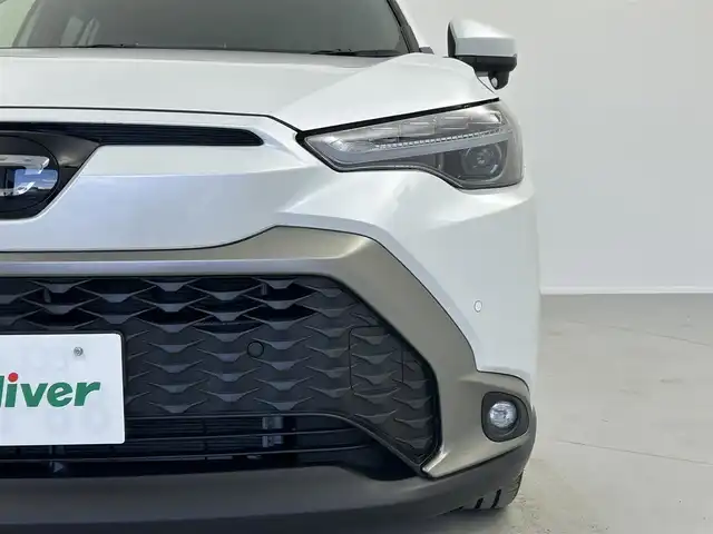 トヨタ カローラ クロス ハイブリッド Z 奈良県 2025(令7)年 1万km プラチナホワイトパールマイカ ・トヨタセーフティセンス/・プリクラッシュセーフティー/・レーンディーパーチャーアラート/・レーダークルーズコントロール/・レーンキープアシスト/・オートマチックハイビーム/・ロードサインアシスト/・先行車発進告知機能/寒冷地仕様/純正ディスプレイオーディオ１０．５インチ/・フルセグTV/Bluetooth/applecarplay//androidauto/miracast/HDMI /バックカメラ　/パワーシート/・ハーフレザーシート/・シートヒーター/ステアリングヒーター/電動リアゲート/SOSコール/純正フロアマット/LEDヘッドライト/・レベライザー有