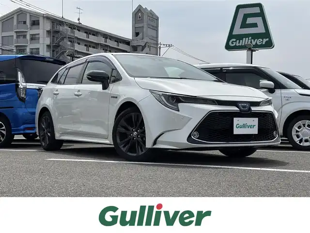 トヨタ カローラツーリング ハイブリッド ダブルバイビー 大分県 2020(令2)年 4万km ホワイトパールクリスタルシャイン ・純正ナビ(BT.USB.Miracast)/・バックカメラ/・フルセグテレビ/・プリクラッシュセーフティ/・レーダークルーズコントロール/・ブラインドスポットモニター/・ETC 2.0/・ドライブレコーダー/・シートヒーター/・ブレーキホールド/・オートハイビーム/・ハンドルヒーター/・ステアリングリモコン