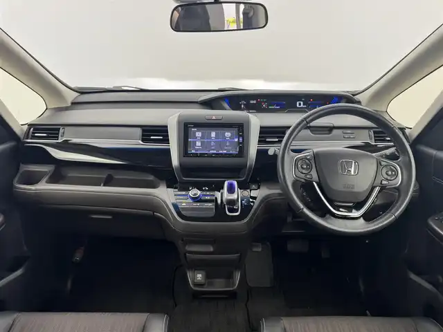 ホンダ フリード ハイブリット モデューロX ホンダセンシング 愛知県 2018(平30)年 7.1万km ホワイトオーキッドパール ホンダセンシング/　　・衝突軽減ブレーキシステム/　　・誤発進抑制機能/　　・歩行者事故低減ステアリング/　　・路外逸脱抑制機能/　　・アダプティブクルーズコントロール/　　・車線維持支援システム/純正7インチナビ　/　　・CD/DVD/BT/フルセグ/バックカメラ/ビルトインETC/革巻きステアリング/ステアリングリモコン/ハーフレザーシート/キャプテンシート/両側パワースライドドア/無限15インチアルミホイール/純正LEDヘッドライト/フォグランプ/取扱説明書/保証書