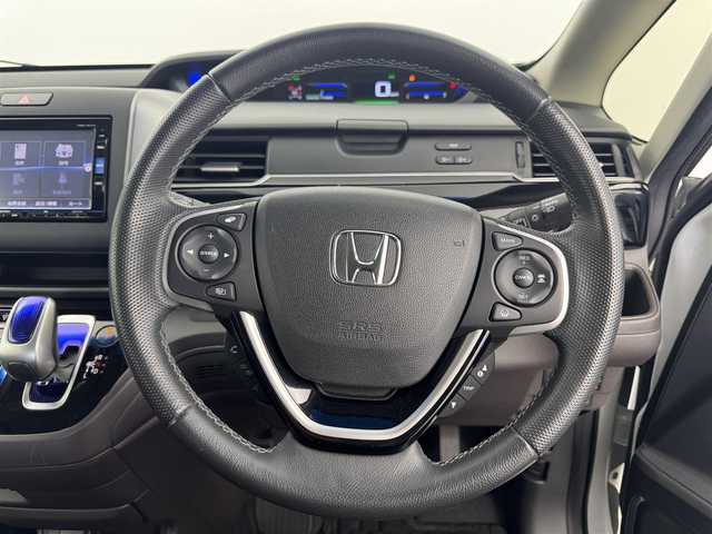 ホンダ フリード ハイブリット モデューロX ホンダセンシング 愛知県 2018(平30)年 7.1万km ホワイトオーキッドパール ホンダセンシング/　　・衝突軽減ブレーキシステム/　　・誤発進抑制機能/　　・歩行者事故低減ステアリング/　　・路外逸脱抑制機能/　　・アダプティブクルーズコントロール/　　・車線維持支援システム/純正7インチナビ　/　　・CD/DVD/BT/フルセグ/バックカメラ/ビルトインETC/革巻きステアリング/ステアリングリモコン/ハーフレザーシート/キャプテンシート/両側パワースライドドア/無限15インチアルミホイール/純正LEDヘッドライト/フォグランプ/取扱説明書/保証書