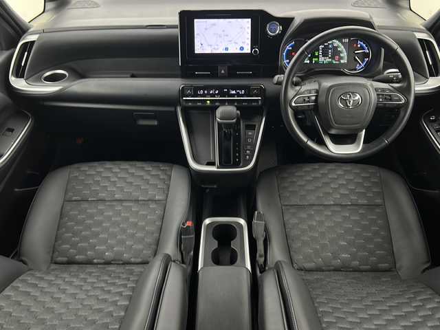 トヨタ ヴォクシー ハイブリッド S－Z 宮城県 2022(令4)年 6.5万km アティチュードブラックマイカ 禁煙車　/ハーフレザーシート/純正14型フリップダウンモニター　　/両側パワースライドドア/トヨタセーフティセンス/・プリクラッシュセーフティ/・レーントレーシングアシスト/・アダプティブクルーズコントロール/・オートハイビーム/・クリアランスソナー/純正8インチナビ/・CD・DVD・USB・BT・Miracast/フルセグTV/バックカメラ/快適利便パッケージ（Mid）　/LEDヘッドライト　/バックモニター　/純正ドライブレコーダー（F）/純正フロアマット　/ビルドインETC2.0/純正フロアマット/純正17インチアルミホイール/ロールサンシェード/ステアリングスイッチ