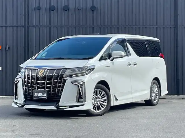 トヨタ アルファードハイブリット S タイプゴールド 福島県 2021(令3)年 7.6万km ホワイトパールクリスタルシャイン ワンオーナー/TRDエアロ/サンルーフ/レーダークルーズコントロール/プリクラッシュセーフティ/レーンキープ/ブラインドスポット/オートマチックハイビーム/デジタルインナーミラー/三眼LEDヘッドライト/純正ナビ/フルセグTV/バックカメラ/フリップダウンモニター/ビルトインETC/パワーバックドア/前後ドライブレコーダー/社外GPSレーダー/純正エンジンスターター/オートホールド/コーナーセンサー/ヒッチメンバー/純正17インチAW/取扱説明書/保証書/スペアキー