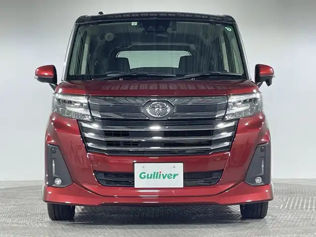 トヨタ ルーミー カスタムG－T 神奈川県 2021(令3)年 2.2万km ブラックマイカメタリック/ファイアークォーツレッドメタリック 純正9型SDナビゲーション【NSZT-Y68T】/AM FM Bluetooth フルセグ HDMI CD DVD USB/バックカメラ/両側パワースライドドア/純正フリップダウンモニター/スマートアシスト/衝突回避支援ブレーキ機能/車線逸脱警報機能/衝突警報機能/ふらつき警報/ブレーキ制御付誤発進抑制機能/サイドビューランプ/先行車発進お知らせ機能/コーナーセンサー/アダプティブクルーズコントロール/アダプティブドライビングビーム/路側逸脱警報/標識認識機能/前方ドライブレコーダー/革巻きステアリング/ステアリングリモコン/シートヒーター/電子パーキングブレーキ/オートホールド/ビルトインETC2.0/純正フロアマット/プッシュスタート/スマートキー/スペアキー/純正15インチアルミホイル/LEDヘッドライト/オートライト/オートマチックハイビーム/ドアバイザー