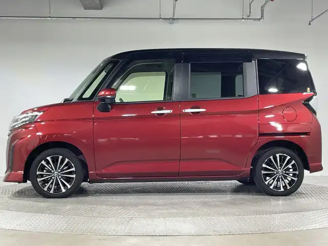 トヨタ ルーミー カスタムG－T 神奈川県 2021(令3)年 2.2万km ブラックマイカメタリック/ファイアークォーツレッドメタリック 純正9型SDナビゲーション【NSZT-Y68T】/AM FM Bluetooth フルセグ HDMI CD DVD USB/バックカメラ/両側パワースライドドア/純正フリップダウンモニター/スマートアシスト/衝突回避支援ブレーキ機能/車線逸脱警報機能/衝突警報機能/ふらつき警報/ブレーキ制御付誤発進抑制機能/サイドビューランプ/先行車発進お知らせ機能/コーナーセンサー/アダプティブクルーズコントロール/アダプティブドライビングビーム/路側逸脱警報/標識認識機能/前方ドライブレコーダー/革巻きステアリング/ステアリングリモコン/シートヒーター/電子パーキングブレーキ/オートホールド/ビルトインETC2.0/純正フロアマット/プッシュスタート/スマートキー/スペアキー/純正15インチアルミホイル/LEDヘッドライト/オートライト/オートマチックハイビーム/ドアバイザー