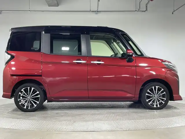 トヨタ ルーミー カスタムG－T 神奈川県 2021(令3)年 2.2万km ブラックマイカメタリック/ファイアークォーツレッドメタリック 純正9型SDナビゲーション【NSZT-Y68T】/AM FM Bluetooth フルセグ HDMI CD DVD USB/バックカメラ/両側パワースライドドア/純正フリップダウンモニター/スマートアシスト/衝突回避支援ブレーキ機能/車線逸脱警報機能/衝突警報機能/ふらつき警報/ブレーキ制御付誤発進抑制機能/サイドビューランプ/先行車発進お知らせ機能/コーナーセンサー/アダプティブクルーズコントロール/アダプティブドライビングビーム/路側逸脱警報/標識認識機能/前方ドライブレコーダー/革巻きステアリング/ステアリングリモコン/シートヒーター/電子パーキングブレーキ/オートホールド/ビルトインETC2.0/純正フロアマット/プッシュスタート/スマートキー/スペアキー/純正15インチアルミホイル/LEDヘッドライト/オートライト/オートマチックハイビーム/ドアバイザー