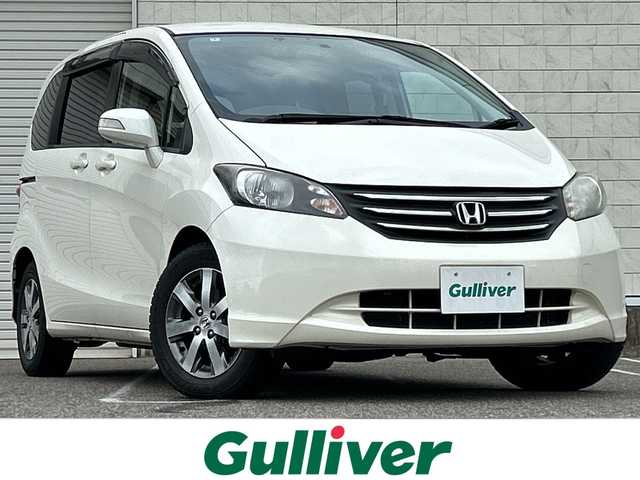 ホンダ フリード G ジャストセレクション 新潟県 2010(平22)年 10.4万km プレミアムホワイトパール 社外ナビ【フルセグTV/FM・AM/】/バックカメラ/後席モニター/ETC/ドライブレコーダー/片側パワースライドドア/スペアキー2本/純正フロアマット/HIDヘッドライト