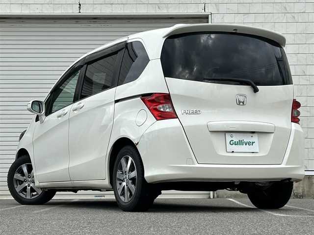 ホンダ フリード G ジャストセレクション 新潟県 2010(平22)年 10.4万km プレミアムホワイトパール 社外ナビ【フルセグTV/FM・AM/】/バックカメラ/後席モニター/ETC/ドライブレコーダー/片側パワースライドドア/スペアキー2本/純正フロアマット/HIDヘッドライト