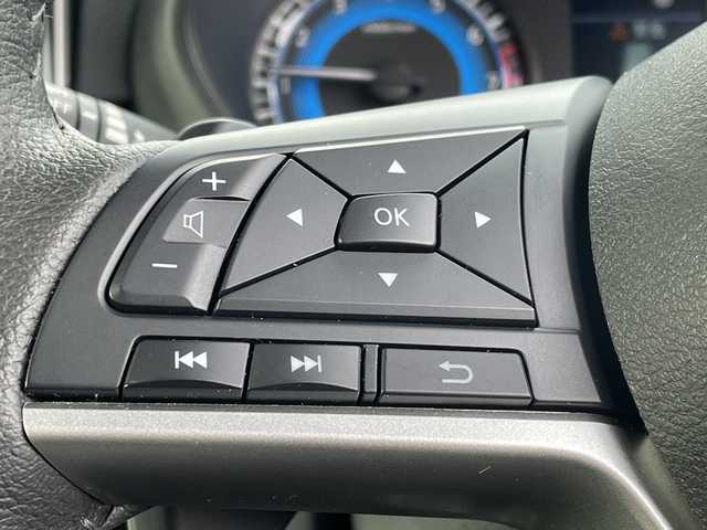 三菱 デリカミニ T プレミアム 長野県 2023(令5)年 0.4万km ＤグリーンＭ 禁煙車/純正9インチナビ/【MM223D-LM】/(フルセグTV/Bluetooth)/e-Assist/・衝突被害軽減ブレーキ/・踏み間違い衝突防止アシスト/・車線逸脱防止支援機能/・オートマチックハイビーム/・ふらつき警報/・前方衝突予測警報/・標識検知システム/・先行車発進通知/・マイパイロット（レーダークルーズコントロール・車線維持支援）/デジタルルームミラー/マルチアラウンドモニター/ビルトインETC/ハンズフリー両側パワースライドドア/前席シートヒーター/ハーフレザーシート/ステアリングヒーター/革巻きステアリング/パドルシフト/ステアリングスイッチ/電動パーキングブレーキ/ブレーキホールド/LEDヘッドライト/オートライト/スマートキー/Pスタート/電動格納ミラー/純正15インチAW/純正フロアマット/ルーフレール