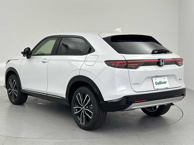 ホンダ ヴェゼル ハイブリッド e:HEV Z 愛知県 2025(令7)年 0.1万km未満 プラチナホワイトパール 登録時走行距離　4km/登録済未使用車/Honda SENSING/●衝突軽減ブレーキ/●先行車発進お知らせ機能/●歩行者事故低減ステアリング/●路外逸脱抑制機能/●標識認識機能/●渋滞追従機能付アダプティブクルーズコントロール/●車線維持支援システム/●トラフィックジャムアシスト/●ブラインドスポットインフォメーション/●誤発進抑制機能/●後方誤発進抑制機能/●近距離衝突軽減ブレーキ/●急アクセル抑制機能/●パーキングセンサーシステム/●後退出庫サポート/●オートハイビーム/●アダプティブドライビングビーム/Honda CONNECTディスプレイオーディオ/・AM/FM/USB/・AppleCarPlay/AndroidAuto/・Bluetooth/・フルセグTV/バックカメラ/ステアリングスイッチ/本革巻きステアリング/ETC2.0/前席シートヒーター/ハンズフリーアクセスパワーテールゲート/LEDシーケンシャルターンシグナルランプ/オートマチックヘッドライト/フォグランプ/ワイヤレス充電器/USB充電【type-C】/フロントグリル【ベルリナブラック】/純正18インチアルミホイール