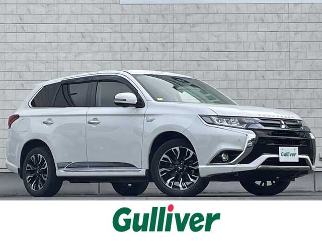 三菱 アウトランダー ＰＨＥＶ G プレミアムパッケージ 岩手県 2016(平28)年 7.8万km シルキーホワイト プッシュスタート/衝突軽減ブレーキ/レーンキープアシスト/コーナーセンサー/フルセグTV/横滑り防止/電動リヤゲート/パワーシート(D席)/電動格納ミラー/パドルシフト/レーンキープアシスト/ステアリングスイッチ/革巻きステアリング/ステアリングヒーター/前方ドライブレコーダー/オートライト/USB入力端子1ヶ所/100V入力端子1ヶ所/純正9型ナビ(AM/FM/CD/DVD/TV/BT)/ALPINE後席モニター/全周囲モニター/バックカメラ/純正フロアマット/充電ケーブル/スペアキー/シートヒーター(D+N席)/ビルトインETC/取扱説明書/保証書/禁煙車