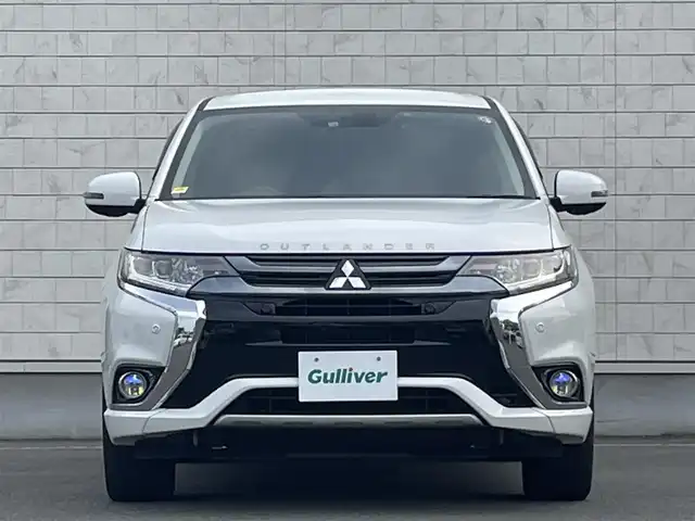 三菱 アウトランダー ＰＨＥＶ G プレミアムパッケージ 岩手県 2016(平28)年 7.8万km シルキーホワイト プッシュスタート/衝突軽減ブレーキ/レーンキープアシスト/コーナーセンサー/フルセグTV/横滑り防止/電動リヤゲート/パワーシート(D席)/電動格納ミラー/パドルシフト/レーンキープアシスト/ステアリングスイッチ/革巻きステアリング/ステアリングヒーター/前方ドライブレコーダー/オートライト/USB入力端子1ヶ所/100V入力端子1ヶ所/純正9型ナビ(AM/FM/CD/DVD/TV/BT)/ALPINE後席モニター/全周囲モニター/バックカメラ/純正フロアマット/充電ケーブル/スペアキー/シートヒーター(D+N席)/ビルトインETC/取扱説明書/保証書/禁煙車