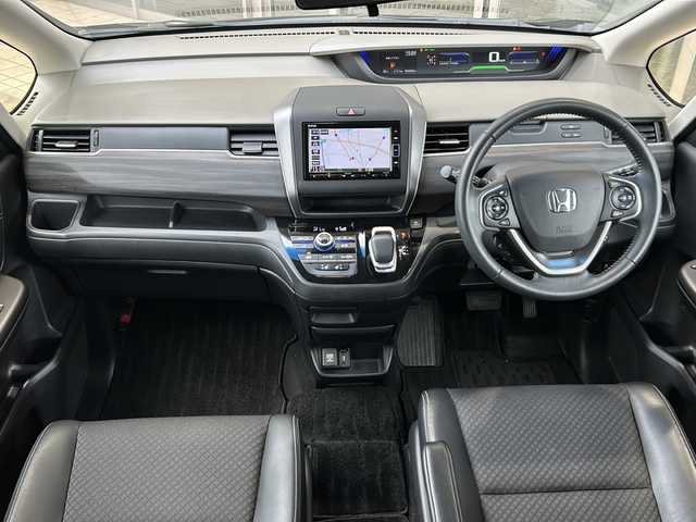 ホンダ フリード ハイブリット G ホンダセンシング 静岡県 2020(令2)年 6.3万km クリスタルブラックパール ホンダセンシング/・衝突軽減ブレーキ/・アクティブクルーズコントロール/・レーンキープアシスト/・ロードサインアシスト/・先行車発進お知らせ機能/純正ナビ/・フルセグTV/・CD/DVD/Bluetooth/MSV/ラジオ/主要装備/・両側パワースライドドア/・バックカメラ/・ETC/・ドライブレコーダー/・シートヒーター/・ハーフレザーシート/・ステアリングリモコン/・オートライト/・プッシュスタート/・スマートキー