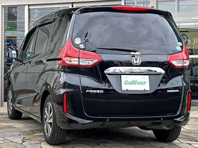 ホンダ フリード ハイブリット G ホンダセンシング 静岡県 2020(令2)年 6.3万km クリスタルブラックパール ホンダセンシング/・衝突軽減ブレーキ/・アクティブクルーズコントロール/・レーンキープアシスト/・ロードサインアシスト/・先行車発進お知らせ機能/純正ナビ/・フルセグTV/・CD/DVD/Bluetooth/MSV/ラジオ/主要装備/・両側パワースライドドア/・バックカメラ/・ETC/・ドライブレコーダー/・シートヒーター/・ハーフレザーシート/・ステアリングリモコン/・オートライト/・プッシュスタート/・スマートキー