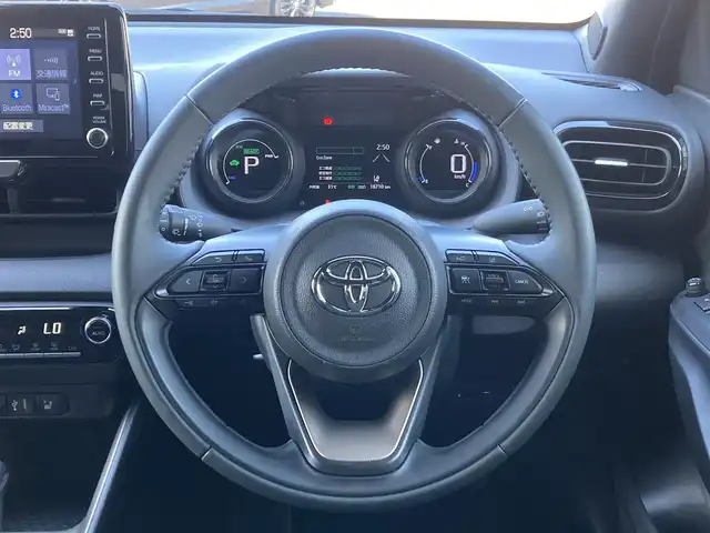 トヨタ ヤリス ハイブリッド Z 千葉県 2021(令3)年 1.9万km シアンM 純正8インチナビ/(BT FM AM)/バックカメラ/衝突被害軽減システム/車線逸脱警報/クルーズコントロール/横滑り防止装置/ビルトインETC/前後ドライブレコーダー/アイドリングストップ/LEDヘッドライト/オートライト/ウィンカーミラー/電動格納ミラー/社外15インチAW/シートヒーター/シートリフター/プッシュスタート/スマートキー/スペアキー/取扱説明書/保証書