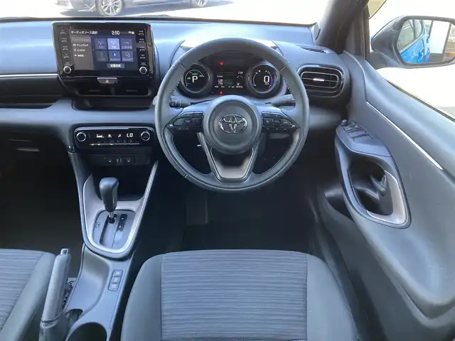 トヨタ ヤリス ハイブリッド Z 千葉県 2021(令3)年 1.9万km シアンM 純正8インチナビ/(BT FM AM)/バックカメラ/衝突被害軽減システム/車線逸脱警報/クルーズコントロール/横滑り防止装置/ビルトインETC/前後ドライブレコーダー/アイドリングストップ/LEDヘッドライト/オートライト/ウィンカーミラー/電動格納ミラー/社外15インチAW/シートヒーター/シートリフター/プッシュスタート/スマートキー/スペアキー/取扱説明書/保証書
