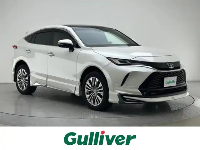 トヨタ ハリアー ハイブリッド Z レザーパッケージ 兵庫県 2021(令3)年 5.1万km ホワイトパールクリスタルシャイン トヨタセーフティセンス/レーダークルーズコントロール/モデリスタエアロ/ガラスルーフ/レーザーシート/パワーシート/シートヒーター＆エアシーター/純正ナビ＆フルセグTV/（AM＆FM＆BT）/全方位カメラ/デジタルインナー/HUD/ETC2.0/JBLプレミアムサウンド/電動格納ミラー/ウィンカーミラー/ステアリングヒーター/オートライト/LEDライト/パワーバックドア/純正19inアルミホイール/ブレーキホールド/電子パーキング/スマートキー/プッシュスタート/フロアマット