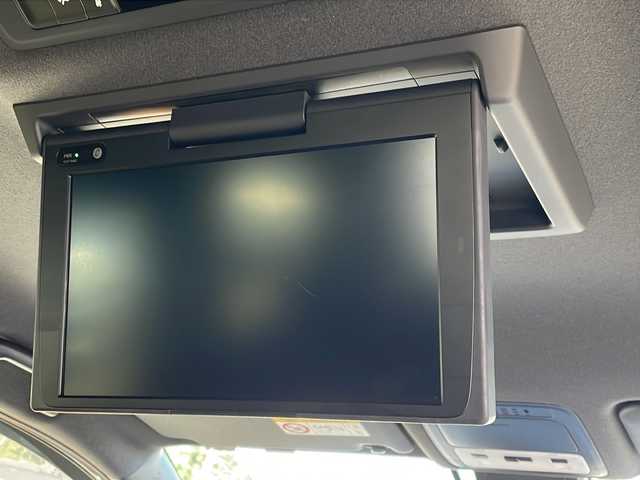 トヨタ ヴォクシー ZS 煌Ⅲ 福岡県 2021(令3)年 4.8万km ブラック 純正10インチワイドナビ/【AM/FM/CD/DVD/SD/BT/フルセグTV】/純正12インチリアフリップダウンモニター/バックカメラ/純正ドライブレコーダー/トヨタセーフティセンス/前後コーナーセンサー/ETC/両側パワースライドドア[/オートマチックハイビーム/ステアリングスイッチ/電動格納ミラー/LEDヘッドライト＆フォグランプ/ハーフレザーシート/後席サンシェード/純正ドアバイザー/スペアタイヤ