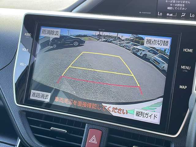 トヨタ ヴォクシー ZS 煌Ⅲ 福岡県 2021(令3)年 4.8万km ブラック 純正10インチワイドナビ/【AM/FM/CD/DVD/SD/BT/フルセグTV】/純正12インチリアフリップダウンモニター/バックカメラ/純正ドライブレコーダー/トヨタセーフティセンス/前後コーナーセンサー/ETC/両側パワースライドドア[/オートマチックハイビーム/ステアリングスイッチ/電動格納ミラー/LEDヘッドライト＆フォグランプ/ハーフレザーシート/後席サンシェード/純正ドアバイザー/スペアタイヤ