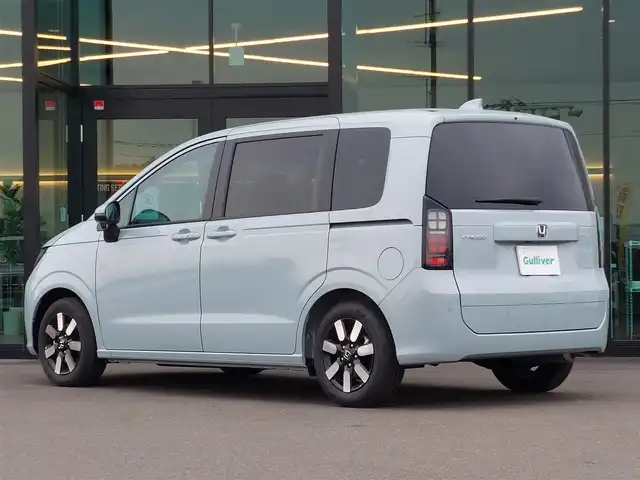 ホンダ フリード AIR EX 東京都 2025(令7)年 0.1万km フィヨルドミストパール Honda SENSING/・衝突軽減ブレーキ/・路外逸脱抑制機能/・車線維持支援システム(LKAS)/・ブラインドスポットインフォメーション/・誤発進抑制機能/・アダプティブクルーズコントロール(ACC)/リアクーラー/純正ディスプレイオーディオ/・AM/FM/HDMI/・Bluetooth/USB/バックカメラ/両側電動スライドドア/コーナーセンサー/LEDヘッドライト/前席シートヒーター/後席サンシェード/USBポート/純正15インチアルミホイール/プッシュスタート/スマートキー