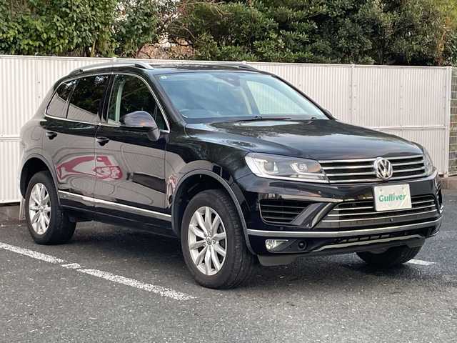 フォルクスワーゲン トゥアレグ V6 Bモーションテクノロジー 茨城県 2015(平27)年 8.6万km 黒 プリクラッシュセーフティシステム/純正ナビ/FM/AM/SD/AUX/Bluetooth接続/ワンセグTV/レザーシート/アダプティブクルーズコントロール/レーンキープアシスト/横滑り防止装置/アラウンドビューモニター/前後コーナーセンサー/パワーシート(D+N席)/メモリーシート(D席)/シートヒーター(D+N席)/ステアリングヒーター/ビルトインETC/保証書/取扱説明書