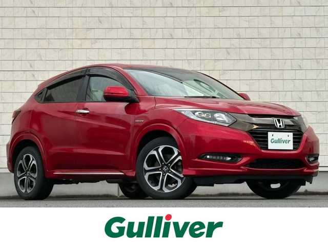 ホンダ ヴェゼル ハイブリッド 岩手県 2016(平28)年 6.3万km プレミアムクリスタルレッドM 禁煙車/4WD/ハーフレザーシート/ミラーヒーター/前席シートヒーター/クルーズコントロール/純正8インチナビ/→フルセグTV/Bluetooth/CD/DVD/HDMI/バックカメラ/ステアリングスイッチ/横滑り防止装置/電子パーキング/オートブレーキホールド/オートライト/LEDヘッドライト/LEDフォグライト/〇プッシュスタート/〇パドルシフト/〇電動格納ミラー/〇ウィンカーミラー/〇ドアバイザー/〇フロアマット/〇シガーソケット/〇USBポート/〇スマートキー/スペアキー/ビルトインETC