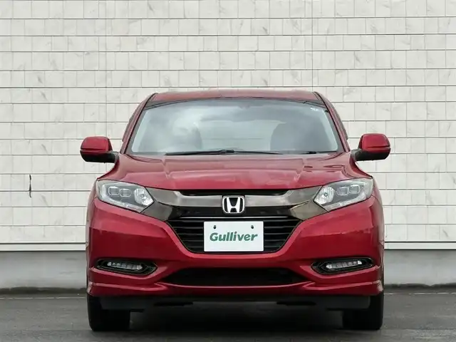 ホンダ ヴェゼル ハイブリッド 岩手県 2016(平28)年 6.3万km プレミアムクリスタルレッドM 禁煙車/4WD/ハーフレザーシート/ミラーヒーター/前席シートヒーター/クルーズコントロール/純正8インチナビ/→フルセグTV/Bluetooth/CD/DVD/HDMI/バックカメラ/ステアリングスイッチ/横滑り防止装置/電子パーキング/オートブレーキホールド/オートライト/LEDヘッドライト/LEDフォグライト/〇プッシュスタート/〇パドルシフト/〇電動格納ミラー/〇ウィンカーミラー/〇ドアバイザー/〇フロアマット/〇シガーソケット/〇USBポート/〇スマートキー/スペアキー/ビルトインETC