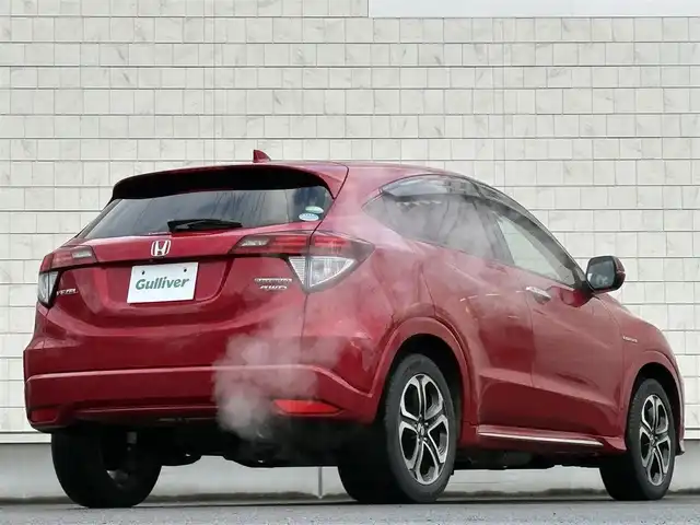 ホンダ ヴェゼル ハイブリッド 岩手県 2016(平28)年 6.3万km プレミアムクリスタルレッドM 禁煙車/4WD/ハーフレザーシート/ミラーヒーター/前席シートヒーター/クルーズコントロール/純正8インチナビ/→フルセグTV/Bluetooth/CD/DVD/HDMI/バックカメラ/ステアリングスイッチ/横滑り防止装置/電子パーキング/オートブレーキホールド/オートライト/LEDヘッドライト/LEDフォグライト/〇プッシュスタート/〇パドルシフト/〇電動格納ミラー/〇ウィンカーミラー/〇ドアバイザー/〇フロアマット/〇シガーソケット/〇USBポート/〇スマートキー/スペアキー/ビルトインETC