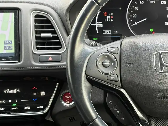 ホンダ ヴェゼル ハイブリッド 岩手県 2016(平28)年 6.3万km プレミアムクリスタルレッドM 禁煙車/4WD/ハーフレザーシート/ミラーヒーター/前席シートヒーター/クルーズコントロール/純正8インチナビ/→フルセグTV/Bluetooth/CD/DVD/HDMI/バックカメラ/ステアリングスイッチ/横滑り防止装置/電子パーキング/オートブレーキホールド/オートライト/LEDヘッドライト/LEDフォグライト/〇プッシュスタート/〇パドルシフト/〇電動格納ミラー/〇ウィンカーミラー/〇ドアバイザー/〇フロアマット/〇シガーソケット/〇USBポート/〇スマートキー/スペアキー/ビルトインETC