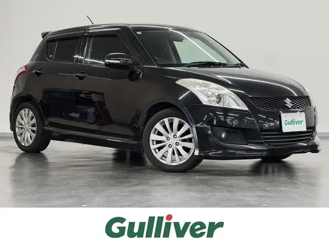 スズキ スイフト RS 三重県 2012(平24)年 8.6万km スーパーブラックパール ガソリン/FF/フロアCVT/クラリオン 7インチ『ROAD EXPLORER SD 2.5』 NX711/（FM/AM/CD/DVD/MUSIC CATCHER/TV/SD/USB/iPod/Bluetooth/VTR）/ETC/安全/・ABS（EBD付）/・運転席、助手席エアバッグ/など/装備/・オートライト/・ディスチャージヘッドライト/・フロントフォグライト/・オートエアコン/・ステアリングスイッチ/・プッシュスタート/・電動格納ドアミラー/・全ドアパワーウインドウ/・パワーステアリング/・スマートキーx2/・保/取/ナビ取/など