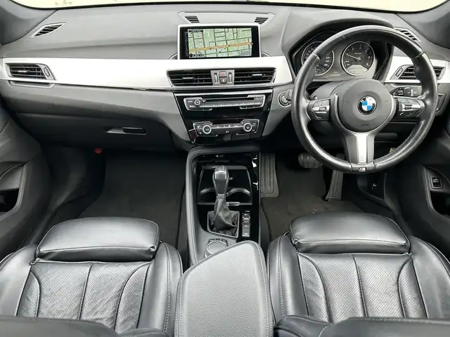 ＢＭＷ Ｘ１ xDrive 18d Mスポーツ 道東・釧路十勝 2017(平29)年 3.9万km ミネラルグレー 社外フルセグTV/純正ナビ(CD/DVD/Bluetooth)/前後ドライブレコーダー/バックカメラ/ミラー一体型ETC/インテリジェントセーフティ/ステアリングスイッチ/革巻きステアリング/シートカバー/コーナーセンサー/アイドリングストップ/コンフォートアクセス/パワーバックドア/オートライト/LEDヘッドライト/取扱説明書/スペアキー/純正18インチAW