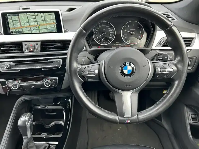 ＢＭＷ Ｘ１ xDrive 18d Mスポーツ 道東・釧路十勝 2017(平29)年 3.9万km ミネラルグレー 社外フルセグTV/純正ナビ(CD/DVD/Bluetooth)/前後ドライブレコーダー/バックカメラ/ミラー一体型ETC/インテリジェントセーフティ/ステアリングスイッチ/革巻きステアリング/シートカバー/コーナーセンサー/アイドリングストップ/コンフォートアクセス/パワーバックドア/オートライト/LEDヘッドライト/取扱説明書/スペアキー/純正18インチAW